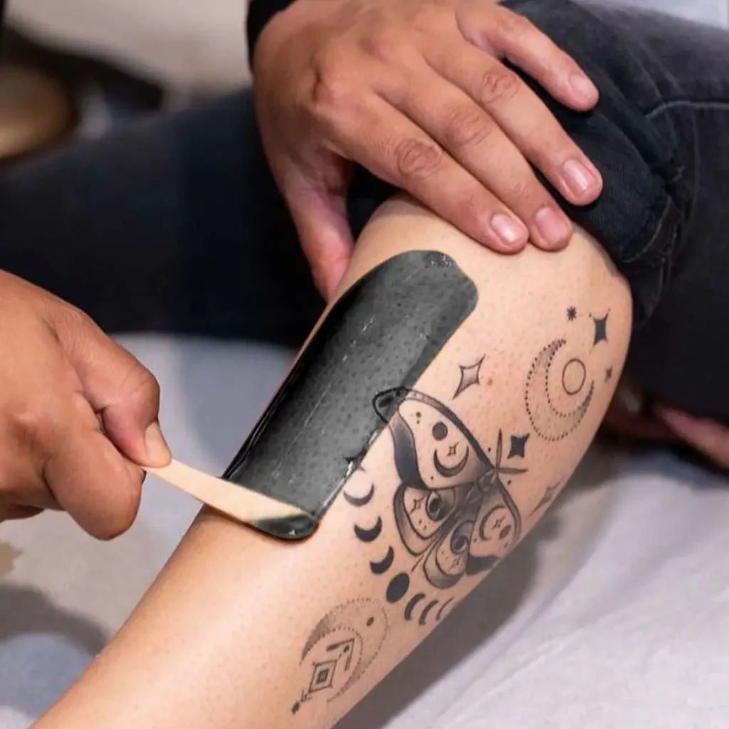 Can You Wax Over A Tattoo? Here's What You Need To Know